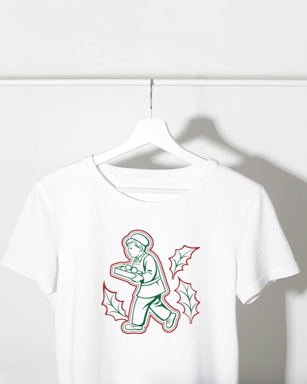 T-shirt au motif vintage, enfant joyeux avec pommes, esprit fêtes de fin d'année